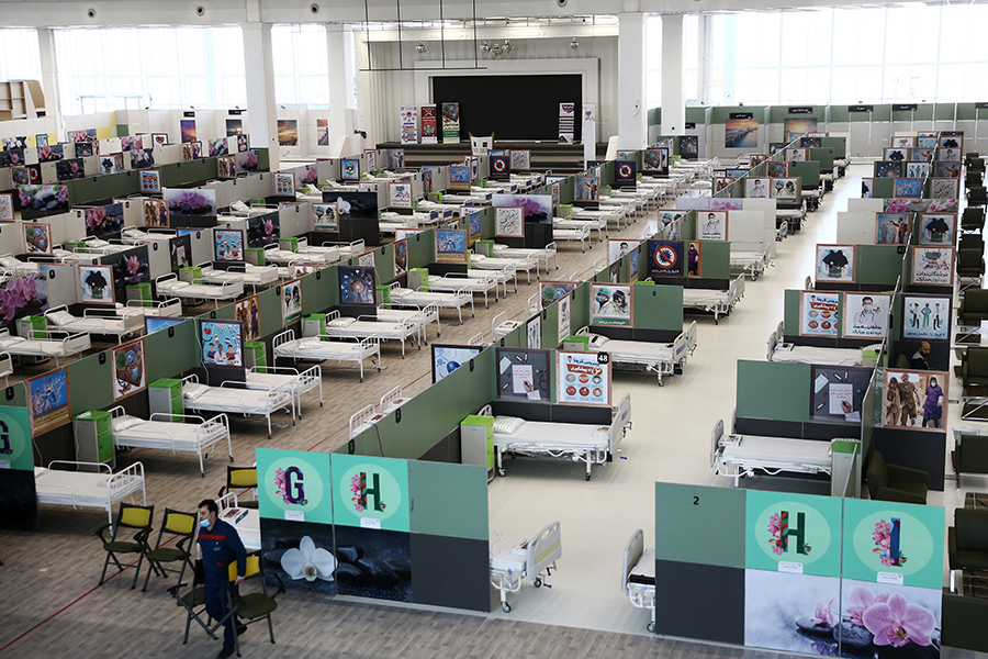 To battle coronavirus disease, Iran converted the fairground of Iranmall, Tehran's largest shopping mall, into a hospital. The pandemic offers insight into the consequences of other global threats, such as climate change or nuclear war. (Photo by Majid Saeedi/Getty Images)