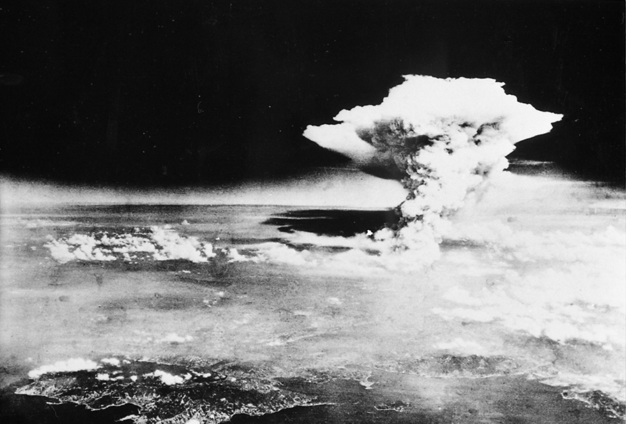 The cloud generated by “Little Boy,” the uranium-based atomic bomb dropped by the United States on Hiroshima, rises above the city with a wartime population of approximately 320,000 on the morning of August 6, 1945. The blast packed a destructive force equivalent to about 15 kilotons of TNT. In minutes, approximately half of the city vanished. (Photo: Hiroshima Peace Memorial Museum)
