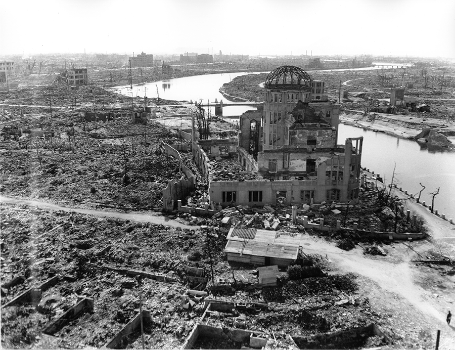 The Hiroshima Prefectural Industrial Promotion Hall stands alone in the rubble. The explosion produced a supersonic shock wave followed by extreme winds that remained above hurricane force more than three kilometers from the hypocenter. A secondary and equally devastating reverse wind ensued, flattening and severely damaging homes and buildings several kilometers further away. Only remnants of a few reinforced structures remained.  (Photo: Hiroshima Peace Memorial Museum)