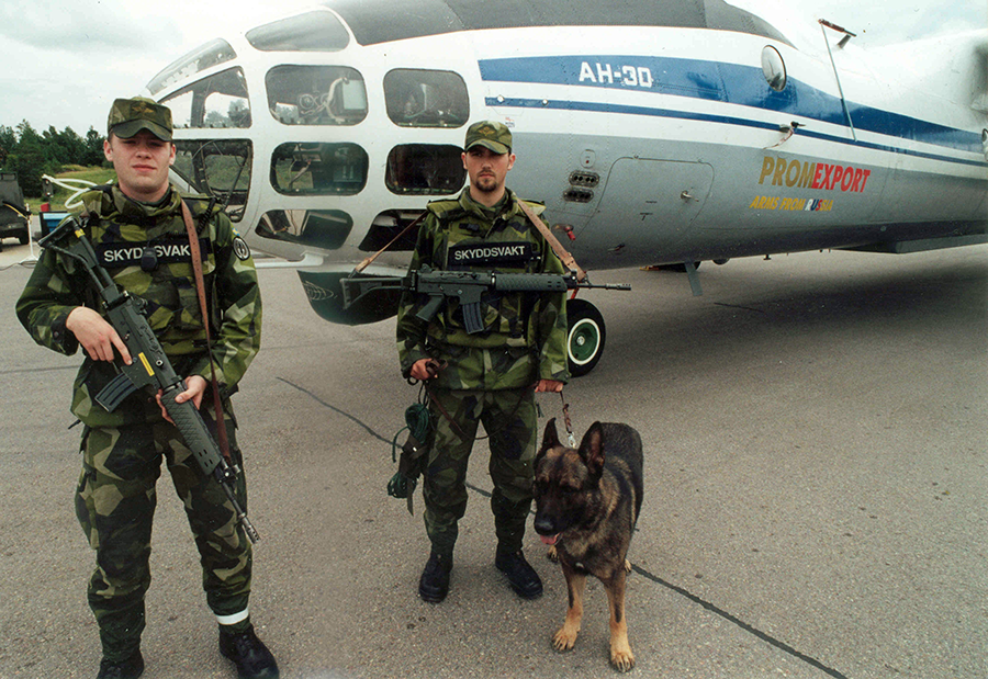 Swedish soldiers guard a Russian aircraft preparing to conduct an Open Skies Treaty observation flight over Sweden in 2000. (Photo: OSCE)