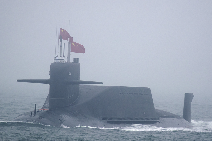 A Chinese Jin-class nuclear submarine participates in a 2019 naval parade in in Shandong Province. (Photo: Mark Schiefelbein/AFP/Getty Images)