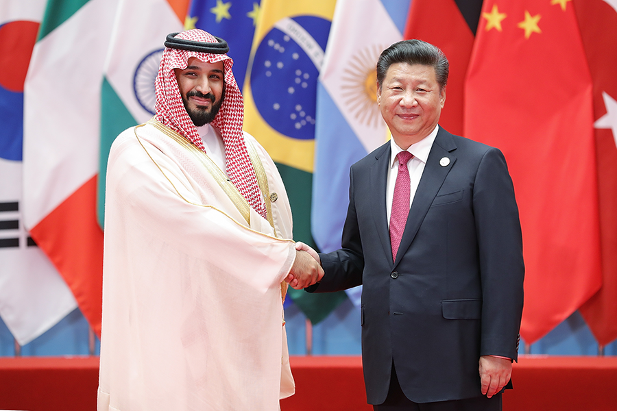 Saudi Arabian Crown Prince Mohammed bin Salman (left) and Chinese President Xi Jinping shake hands at the 2016 G20 Summit in China. Recent reports have suggested that China is backing the construction of a uranium processing facility in Saudi Arabia. (Photo: Lintao Zhang/Getty Images)