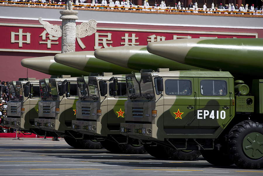 Chinese military vehicles display DF-26 ballistic missiles during a 2015 parade in Beijing. The missiles would be the most likely to field a low-yield nuclear warhead, should China develop one, according to Pentagon assessments. (Photo: Andy Wong/Getty Images)
