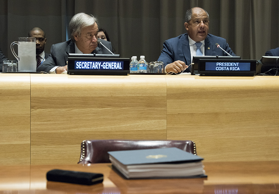 UN Secretary-General António Guterres (left) and Luis Guillermo Solís Rivera, president of Costa Rica, preside over the signing ceremony of the Treaty on the Prohibition of Nuclear Weapons at the United Nations on July 7, 2017. (Photo: Kim Haughton/UN)