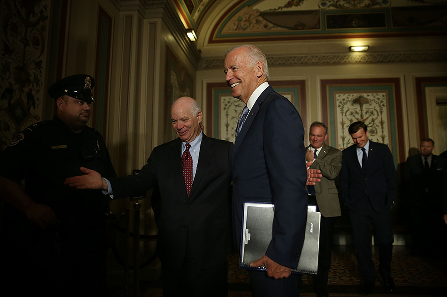 Vice President Joe Biden visits members of the Senate Foreign Relations Committee in 2015 to discuss the Iran nuclear deal. As president, he may seek to reverse the U.S. withdrawal from the deal, but the agreement does not contain provisions for such a move. (Photo: Alex Wong/Getty Images)