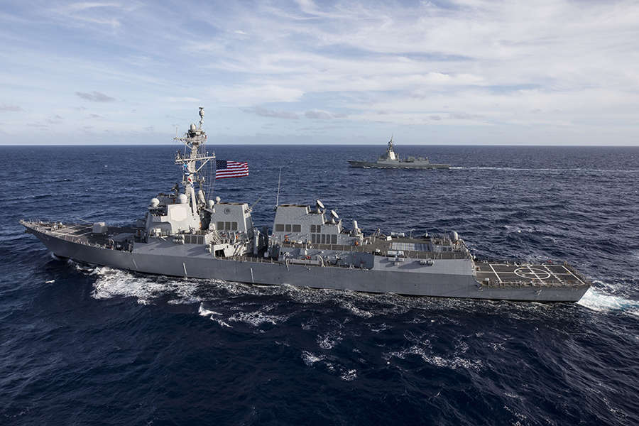 The USS John Finn (foreground) exercises with an Australian destroyer in 2018. Based in Hawaii, the U.S. ship launched an SM-3 interceptor that successfully destroyed an ICBM target. (Photo: Jesus Sepulveda/U.S. Marine Corps)