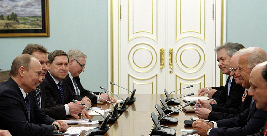 Russian Prime Minister Vladimir Putin (L) and then-U.S. Vice President Joe Biden (2nd R) meet on March 10, 2011 with their delegations in Moscow. (Photo: Alexy Druzhinin/AFP via Getty Images)