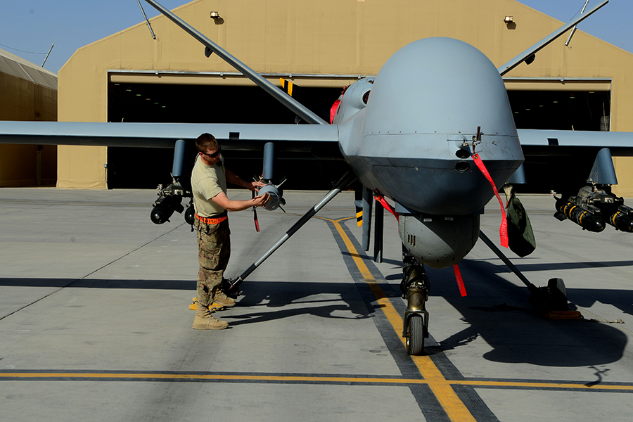 A technician examines an MQ-9 Reaper drone at an Afghan air base in 2014. Trump administration plans to sell Reapers to the United Arab Emirates were not stopped by Congress, but still face an uncertain future. (Photo: Evelyn Chavez/U.S. Air Force)
