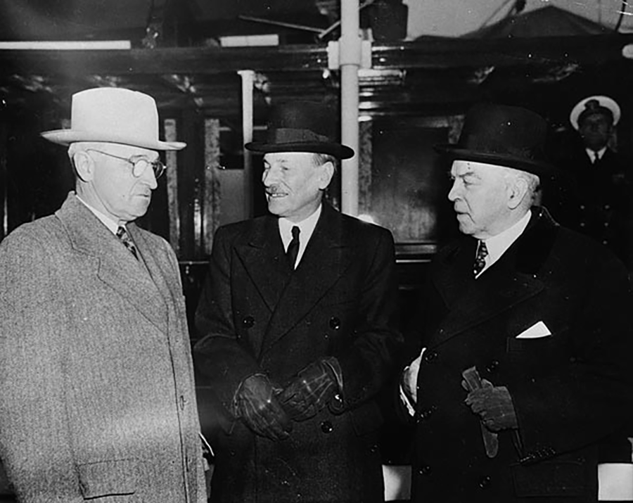 U.S. President Harry Truman (left), UK Prime Minister Clement Atlee (center), and Canadian Prime Minister Mackenzie meet aboard the USCG Sequoia in Washington in November 1945. Their discussions addressed the international control of atomic energy, and their summit statement led to the creation of the UN Atomic Energy Commission. (Photo: Harris and Ewing/BiblioArchives/LibraryArchives, Canada)