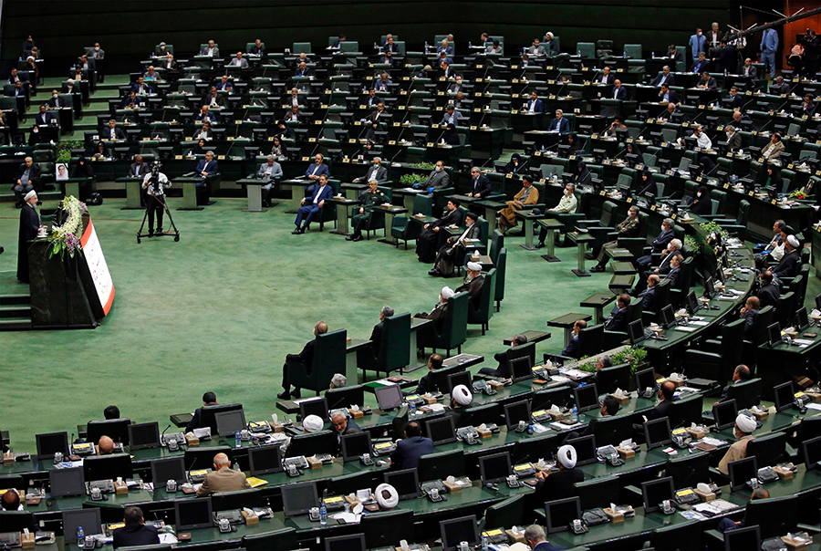 Iranian President Hassan Rouhani delivers a speech during the inaugural session of the new parliament in Tehran on May 27, 2020. The parliament approved legislation in 2020 mandating that the government take certain steps to breach the limits of the 2015 nuclear deal in order to pressure the United States to return to the agreement and waive sanctions. (Photo: AFP via Getty Images)