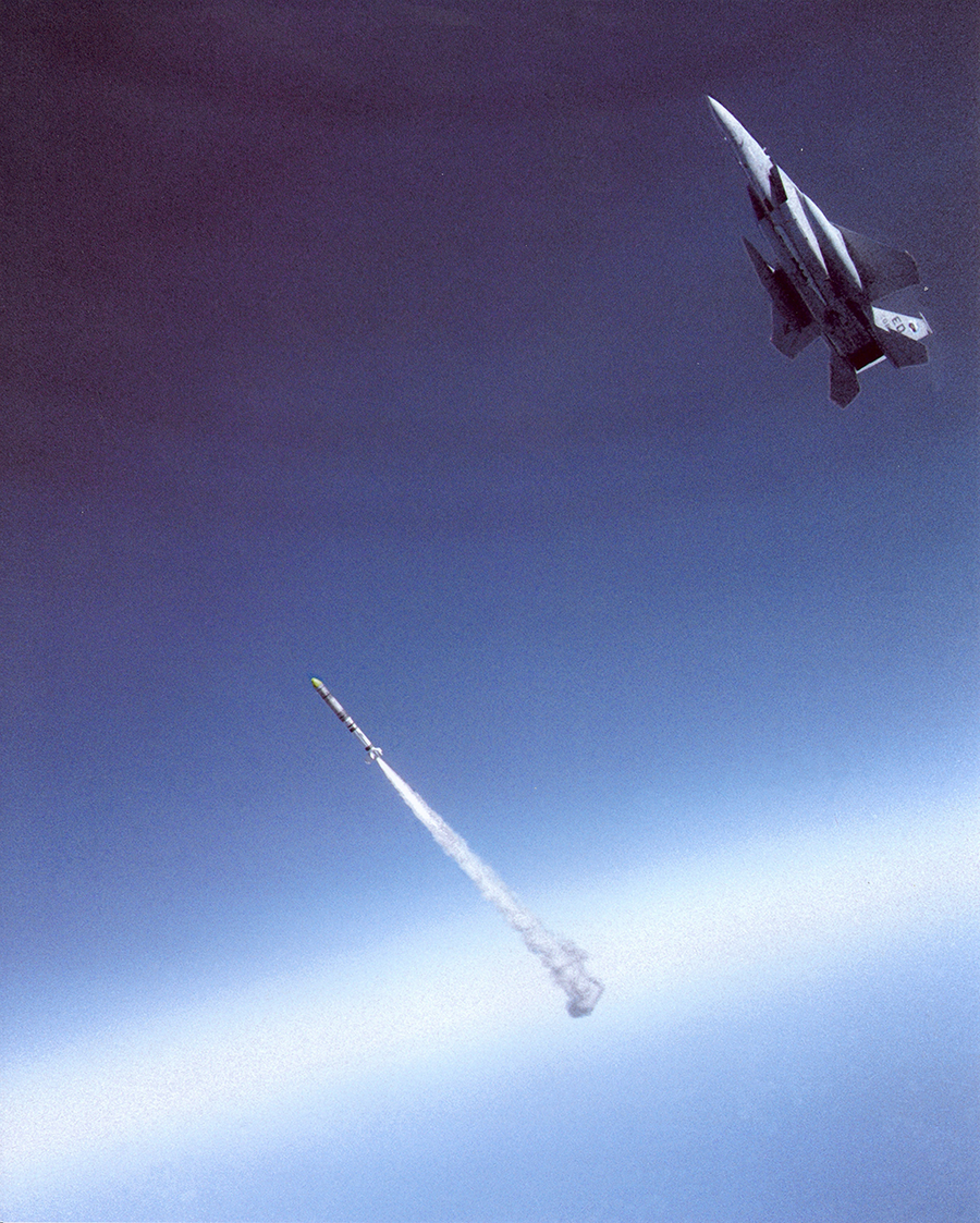 A U.S. Air Force F-15A a mile high over the Pacific Ocean launches a multi-stage ASM-135 missile as part of an anti-satellite intercept test on September 13, 1985. In 1958, the United States first began experimenting with ASAT weapons, beginning with air-launched ballistic missiles and later, ground-launched ballistic missiles. The Soviet Union pursued similar experiments, as well as co-orbital ASAT systems. In the late-1970s, the United States began to develop non-nuclear, kinetic ASAT capabilities, such as the air-launched ASM-135. (Photo: U.S. Air Force)