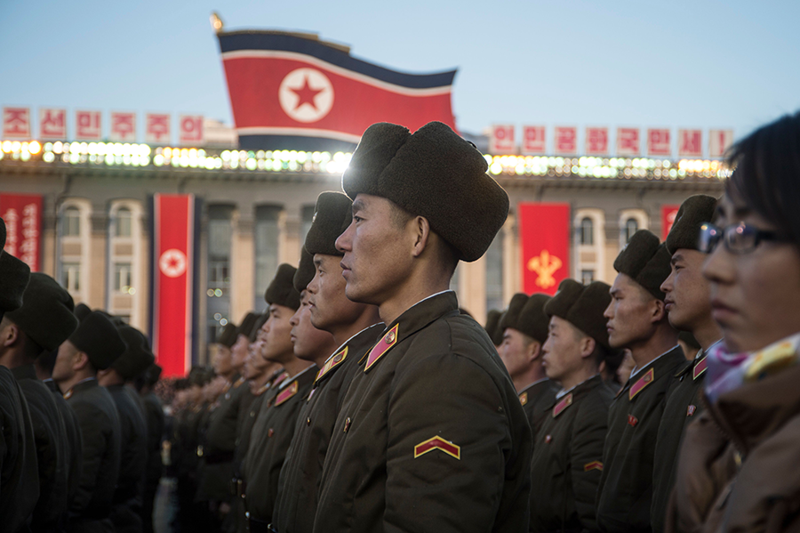 North Korean soldiers attend a mass rally in Pyongyang's Kim Il Sung Square after North Korean leader Kim Jong Un declared on Nov. 29, 2017 that the country had achieved full nuclear statehood. Four years later, the North's nuclear capabilities continue to advance, confronting President Joe Biden with the challenge. (Photo by Kim Won-Jin/AFP via Getty Images)