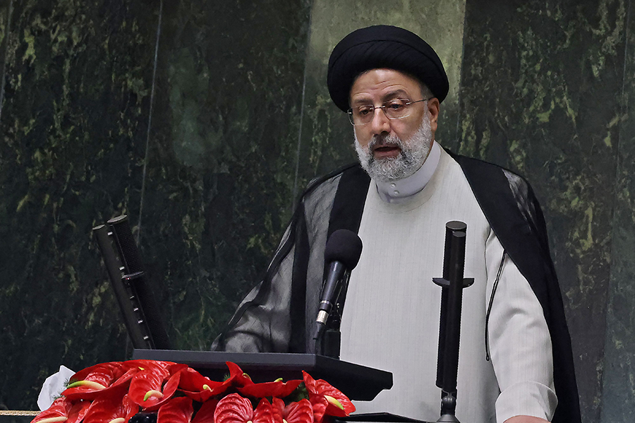 Will Iran's newly inaugurated President Ebrahim Raisi, shown at his Aug. 5 swearing-in ceremony in Tehran, insist on renegotiating certain issues as part of a nuclear deal with the United States? If so, the move could threaten the agreement.  (Photo by Atta Kenare/AFP via Getty Images)