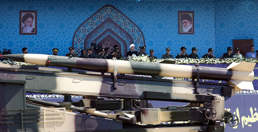 An Iranian medium range missile passes by the official reviewing stand in Tehran during the annual military parade in September 2017, marking the anniversary of the outbreak of Iran's devastating 1980–1988 war with Iraq. Iran's diverse and growing missile arsenal concerns the United States and its allies. (Photo by STR/AFP via Getty Images)