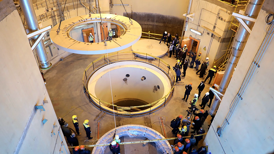 In this photo, released by Iran's Atomic Energy Agency and dated 2019, technicians work at the Arak heavy water plant, one part of the country's vast nuclear infrastructure.