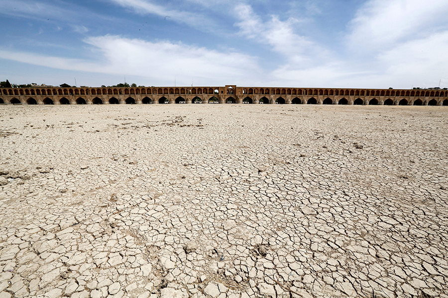 One less politically sensitive challenge that could lend itself to cooperation among Middle Eastern states is combating climate change.  The Zayandeh Rud river in Isfahan, shown in this image from 2018, now often runs dry due to water extraction before it reaches the city. (Photo by Atta Kenare/AFP via Getty Images)
