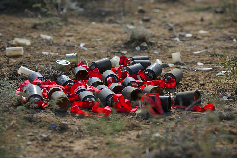 These unexploded cluster bomb submunitions hit a remote area of Azerbaijan near the Baku-Tbilisi-Ceyhan crude oil pipeline in October 2020 during the military conflict over the breakaway region of Nagorno-Karabakh. (Photo by Aziz Karimov/Getty Images)