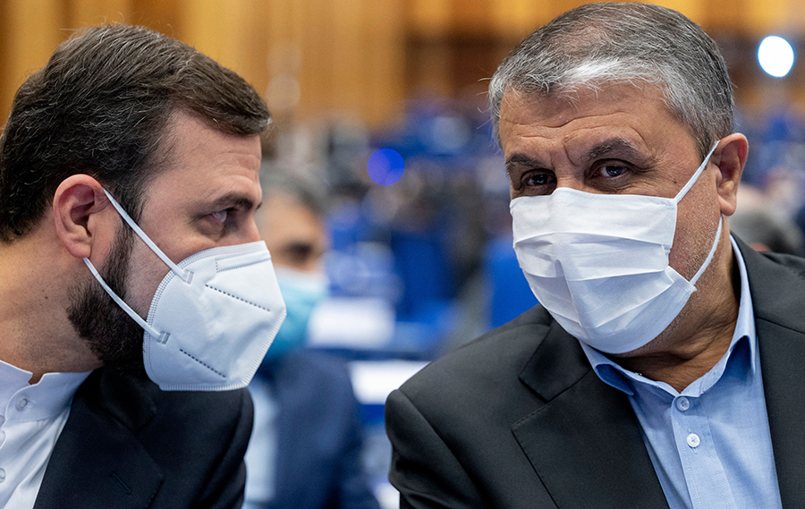 The chief of the Atomic Energy Organization of Iran, Mohammad Eslami (R), and Iran's governor to the International Atomic Energy Agency (IAEA), Kazem Gharibabadi, attend the IAEA General Conference, an annual meeting of all member states, at the agency's headquarters in Vienna on September 20, 2021. (Photo by Joe Klamar/AFP via Getty Images)