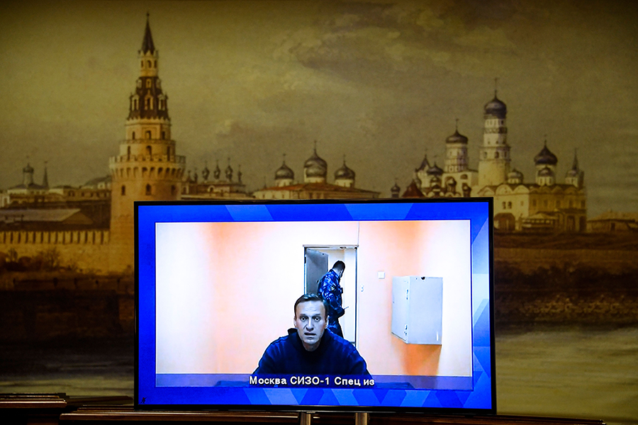 Russian opposition leader Alexei Navalny, who has accused Russian President Vladimir Putin of poisoning him, remains imprisoned in Moscow. (Photo by Alexander Nemenov/AFP via Getty Images)