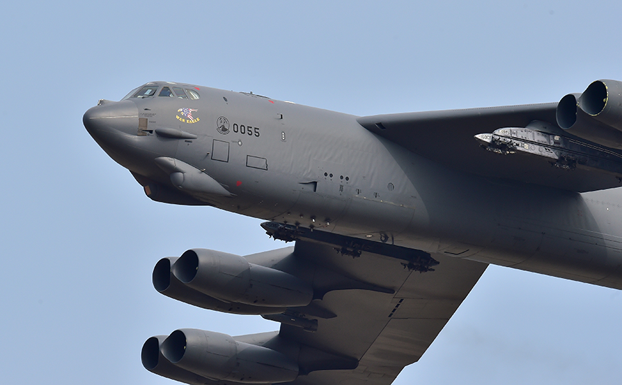 A US B-52 Stratofortress bomber flies over the Osan Air Base in Pyeongtaek, south of Seoul, in 2016 in a show of force against North Korea. (Photo by Jung Yeon-Je/AFP via Getty Images)