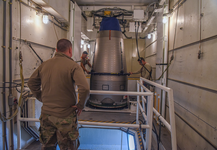 Airmen from the 90th Maintenance Group at F.E. Warren missile complex in Wyoming work on maintaining an intercontinental ballistic missile (ICBM), one leg of the nuclear triad, in December 2019. (Photo by U.S. Air Force)