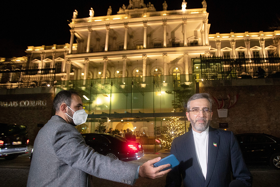 Ali Bagheri Kani, the chief Iranian nuclear negotiator, speaks to journalists in front of the Palais Coburg in Vienna, the venue for negotiations aimed at reviving the Iran nuclear deal, on Dec. 27. (Photo by ALEX HALADA/AFP via Getty Images)