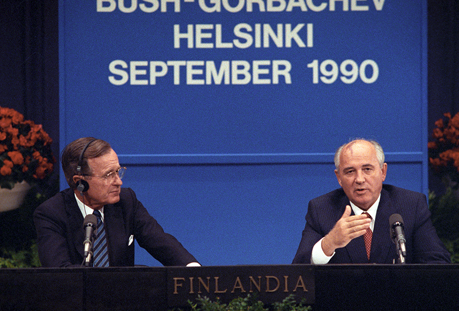 U.S. President H.W. Bush and Soviet leader Mikhail Gorbachev hold a press conference at their summit in Helsinki in September 1990. (Photo by TASS via Getty Images)