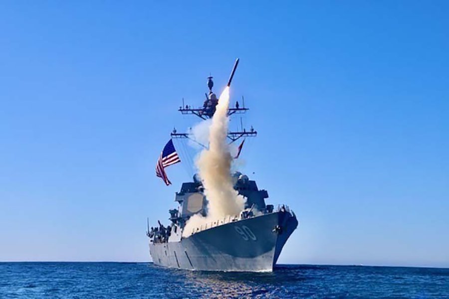 The guided-missile destroyer USS Chafee (DDG 90) launches a Block V Tomahawk, the weapon’s newest variant, during a missile exercise. President Joe Biden has reversed his predecessor’s policy and cancelled plans for a nuclear version of the sea-launched cruise missile. (U.S. Navy photo by LTJG Sean Ianno)