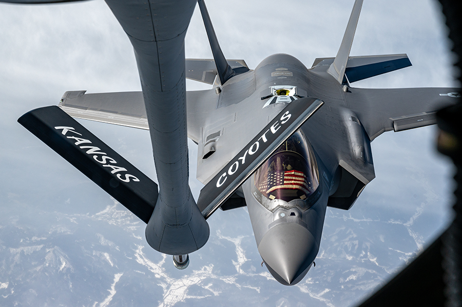 An F-35A Lightning II jet fighter, conducting joint operations from Kadena Air Base, Japan, approaches a tanker aircraft for refueling. The F-35 is a main driver of current and future U.S. arms sales in Europe, according to an annual report by the Stockholm International Peace Research Institute. (U.S. Air Force photo by Airman 1st Class Yosselin Perla)