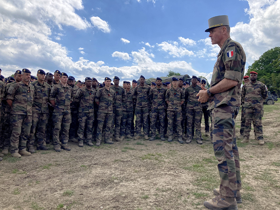 General Pierre Schill (R), chief of staff of the French Army, visits French troops deployed with NATO in Cincu, Romania in May 2022. (Photo by Didier Lauras/AFP via Getty Images)