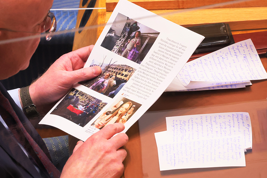 Russian Ambassador Vasily Nebenzia holds documents as he speaks during the March 11 UN Security Council meeting called by Russia to discuss its claim of U.S.-supported chemical and biological weapon labs in Ukraine. Kyiv and Washington denied the allegations and called them Russian disinformation. (Photo by Michael M. Santiago/Getty Images)