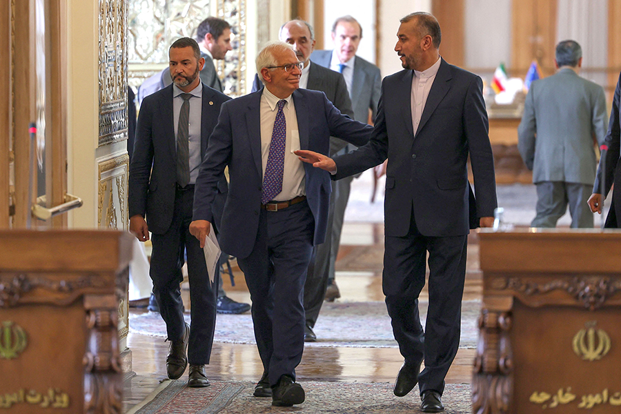 Iran's Foreign Minister Hossein Amirabdollahian (R) walks to a press conference with Josep Borell, the European Union foreign policy chief (C), at the Iranian Foreign Ministry in Tehran on June 25. Borrell appeared to succeed in getting Iran and the United States to resume indirect talks over restoring the 2015 Iran nuclear deal. (Photo by Atta Kenare/AFP via Getty Image)