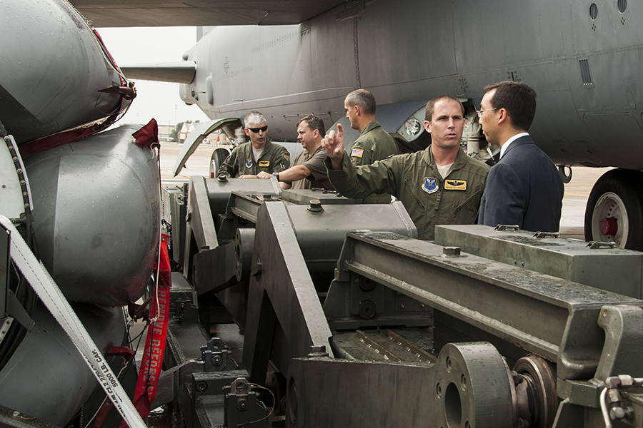 Support staff with the Air Force Nuclear Command, Control and Communications Center are briefed on the capabilities of the B-52 Stratofortress during a visit to Barksdale Air Force Base, La., in 2014. (U.S. Air Force photo by Master Sgt. Jeff Walston/Released)