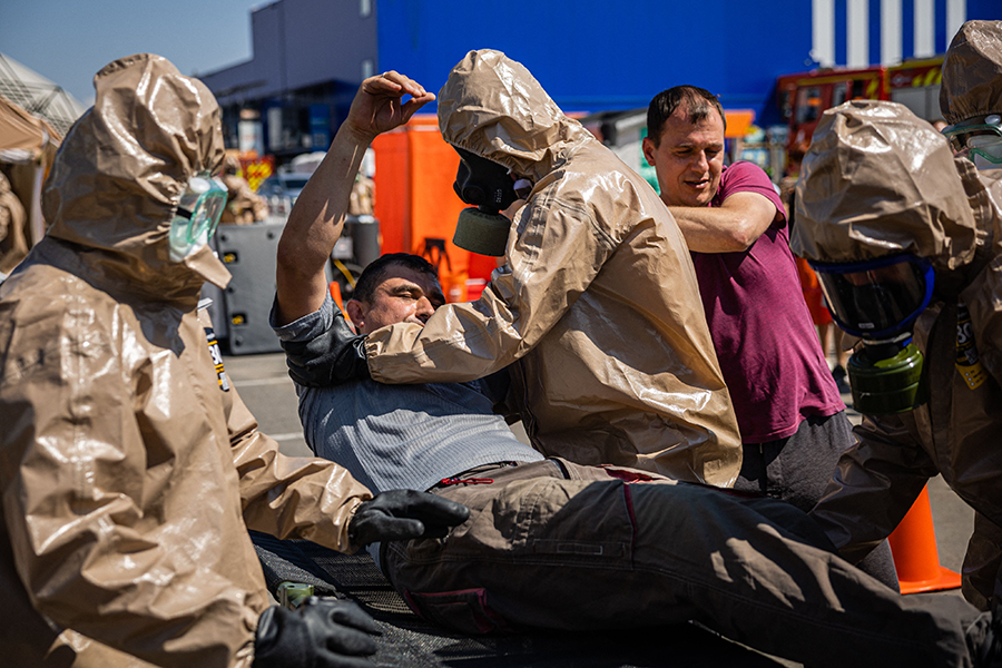 Rescuers from the Ukrainian Emergency Ministry participated in an exercise in the city of Zaporizhzhia on August 17 in case of a possible nuclear incident at the nearby Zaporizhzhia nuclear power plant. Russia occupied the plant at the start of the war against Ukraine and still controls it.  (Photo by Dimitar Dilkoff/AFP via Getty Images)