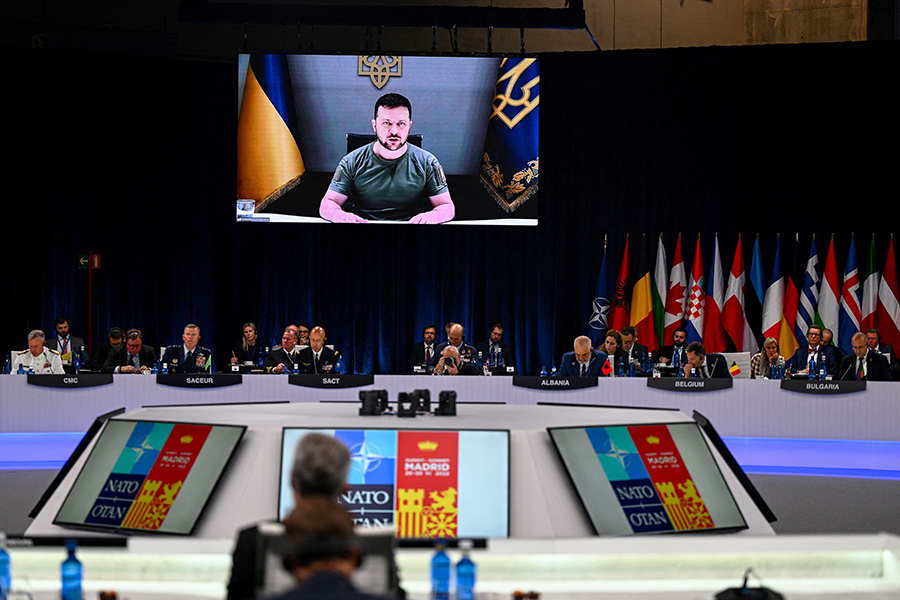 At their June summit in Madrid, where Ukrainian President Volodymyr Zelenskyy spoke remotely, NATO leaders agreed to augment alliance capabilities to defend the frontline states. (Photo by Gabriel Bouys/AFP via Getty Images)