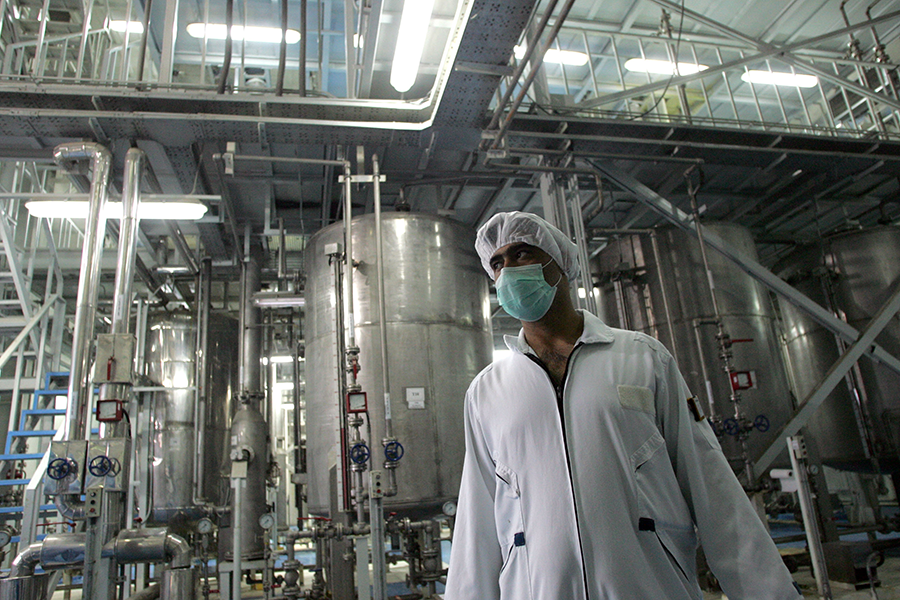 An Iranian technician works at Iran’s uranium conversion facility in Isfahan in 2007. Experts fear that Iran could have the capability to produce enough weapons-grade uranium for a nuclear weapon in a matter of days if the 2015 Joint Comprehensive Plan of Action nuclear deal is not revived. (Behrouz Mehri/AFP via Getty Images)