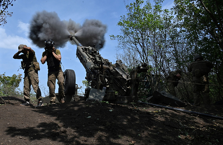 The annual conference of states-parties to the Arms Trade Treaty discussed improving controls over weapons after their delivery against the backdrop of the Russian war on Ukraine. In this photo, Ukrainian forces fire a U.S.-made M777 howitzer on the front line in the Kharkiv region of Ukraine on Aug. 1.   (Photo by Sergey Bobok/AFP via Getty Images)