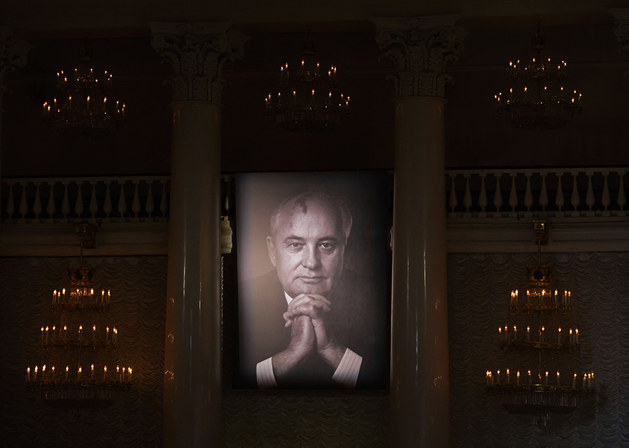 A portrait of Mikhail Gorbachev, the last leader of the Soviet Union, is displayed on the wall during his memorial service at the Column Hall of the House of Unions in Moscow, on September 3. (Photo by Evgenia Novozhenina/POOL/AFP via Getty Images)