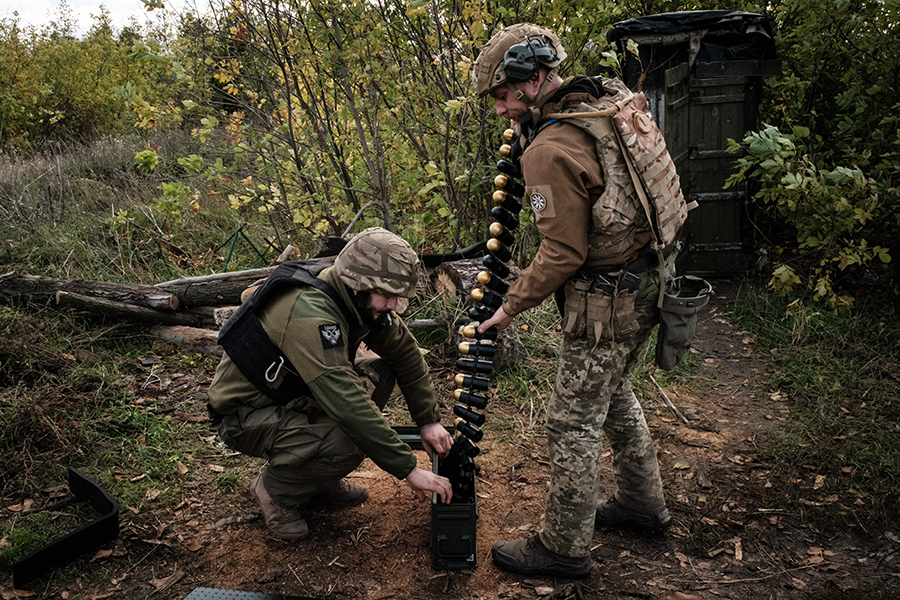 U.S. weapons transfers to Ukraine, such as this MK-19 automatic grenade launcher being aimed at Russian positions by Ukrainian soldiers near the front-line in the Donetsk region, are having a big impact on the U.S. defense budget.  (Photo by Yasuyoshi Chiba/AFP via Getty Images)