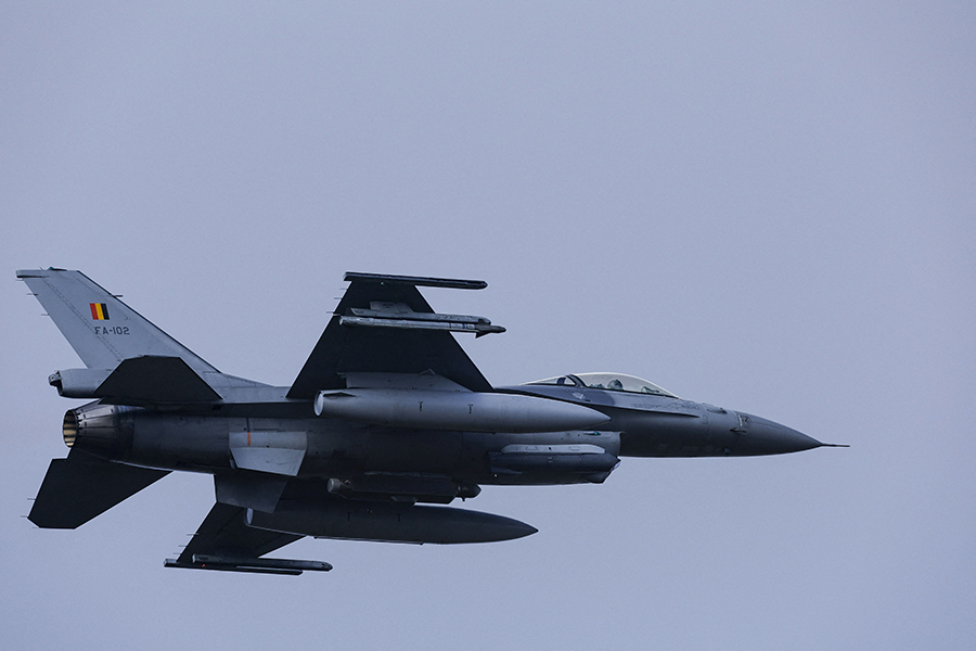 A Belgian F-16 jet fighter was among the weapons systems that participated in NATO’s annual nuclear exercise, called Steadfast Noon, in mid-October as tensions with Russia heightened over the war in Ukraine. (Photo by Kenzo Triboulillard/AFP via Getty Images)