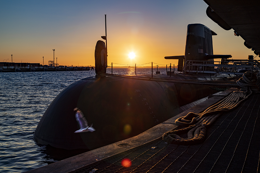 Australia plans to replace this conventionally-powered Collins-class submarine with nuclear-powered submarines from the United Kingdom and the United States under their new AUKUS defense pact. The deal has raised many questions.  (Photo by POIS Yuri Ramsey/Australian Defence Force via Getty Images)