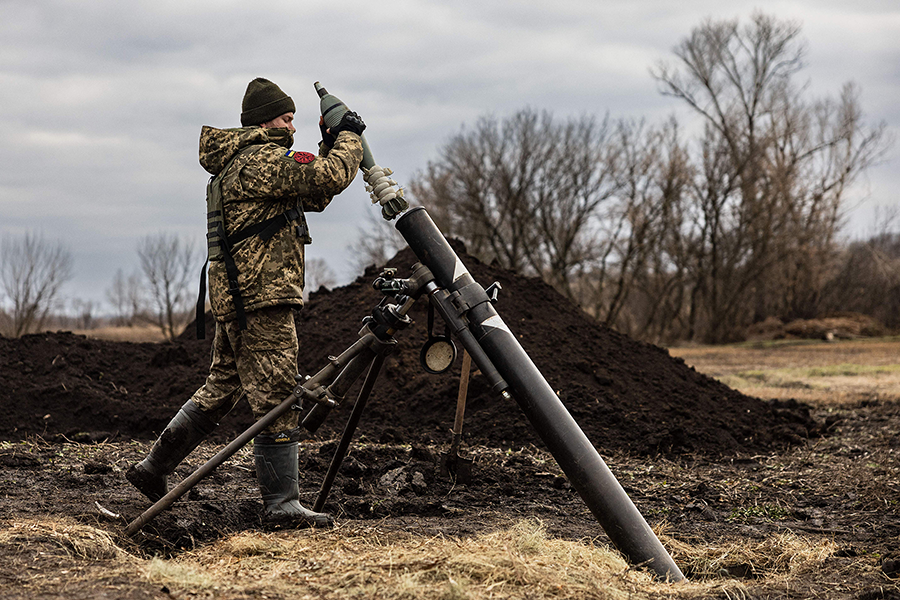 One risk of advanced computing technologies is that they shorten decision-making time by accelerating the pace of conflict scenarios. In December, a Ukrainian soldier loaded a mortar launcher before firing on Russian positions in eastern Ukraine.  (Photo by SAMEER AL-DOUMY/AFP via Getty Images)