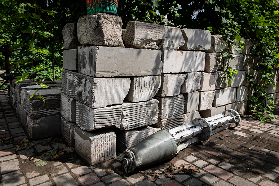 Part of a cluster bomb is seen in the village of Shevchenkove, Ukraine, after attacks by Ukrainian and Russian forces in October. (Photo by Alex Chan Tsz Yuk/SOPA Images/LightRocket via Getty Images)