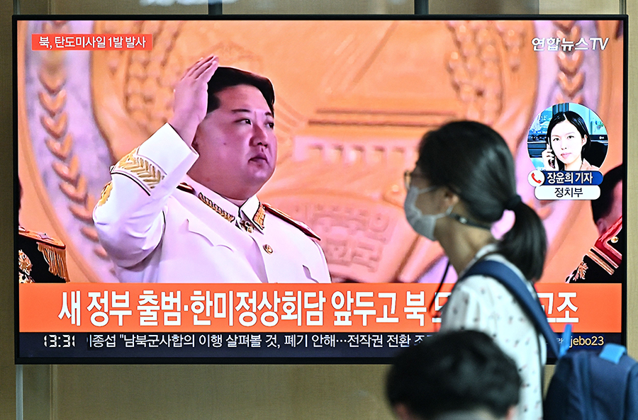 North Korean leader Kim Jong Un shown in file footage on South Korean television in May after his country fired off one in a year-long series of ballistic missile tests. (Photo by JUNG YEON-JE/AFP via Getty Images)