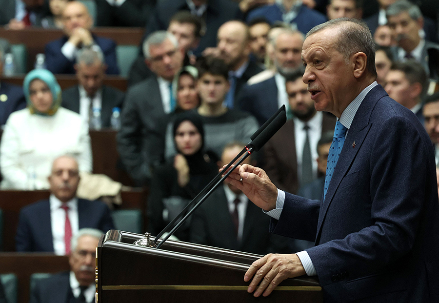 Turkish President Recep Tayyip Erdoğan, shown speaking to the Turkish Grand National Assembly in January, has announced plans to double the range of his country's ballistic missiles. (Photo by ADEM ALTAN/AFP via Getty Images)