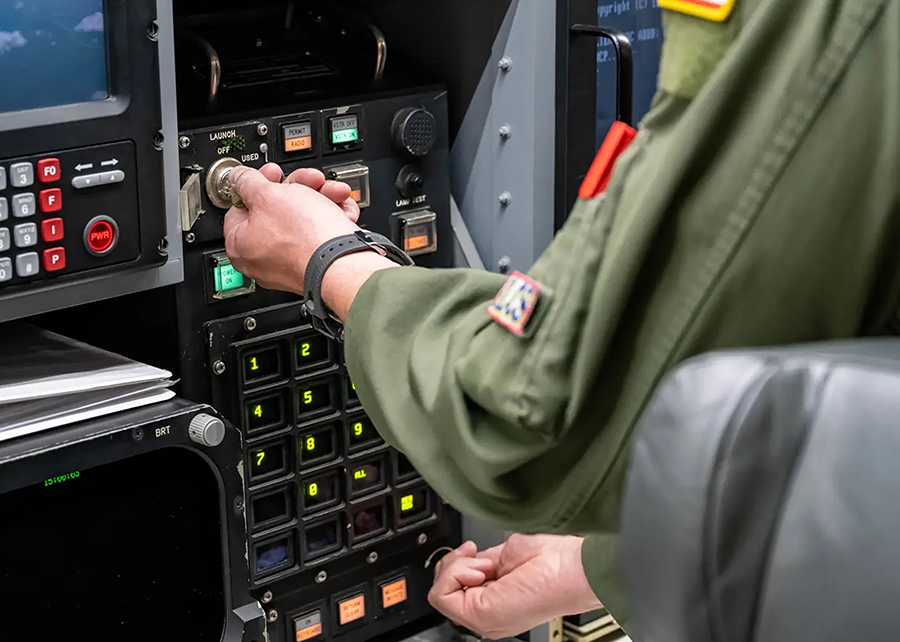 After the Russians tested an intercontinental ballistic missile (ICBM) that landed at a test site in Kazakhstan on April 11, the U.S. Air Force released pictures that it says shows service members aboard an E-6B Mercury 'doomsday plane' initiating the test launch of an unarmed LGM-30G Minuteman III ICBM on April 19. (U.S. Air Force photo)