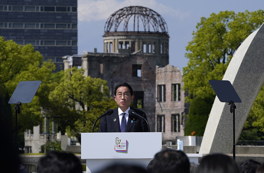 Japanese Prime Minister Fumio Kishida, speaking against the backdrop of the Cenotaph for Atomic Bomb Victims and the Atomic Bomb Dome in the Peace Memorial Park on May 21, hosted the Group of Seven leaders’ summit at Hiroshima with the intent of elevating attention to the dangers of nuclear war. (Photo by Kimimasa Mayama/POOL/AFP via Getty Images)
