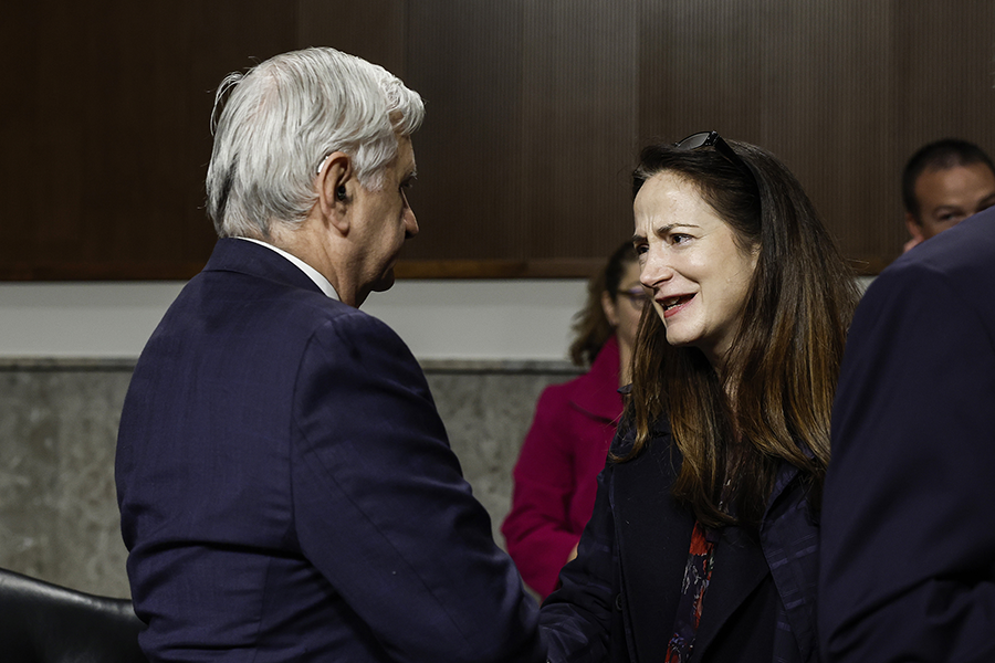 Chairman Jack Reed (D-RI) greets Director of National Intelligence Avril Haines before she testifies at a Senate Armed Services Committee hearing on worldwide threats on May 4 in Washington. (Photo by Anna Moneymaker/Getty Images)