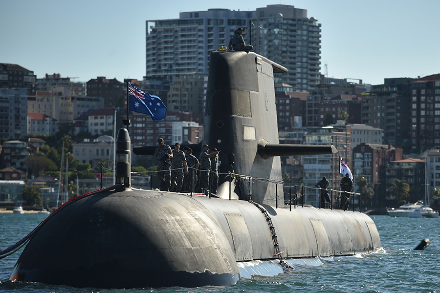 Until it struck an agreement with the United Kingdom and the United States for nuclear-propelled submarines, Australia planned to replace its Collins-class diesel-electric submarines, such as the one shown, with a conventionally-powered French model. To assuage concerns about the AUKUS nuclear technology transfer, Australia has made new nonproliferation commitments but would Canberra renege on those as it did on the French deal? (Photo by Peter Parks/AFP via Getty Images)