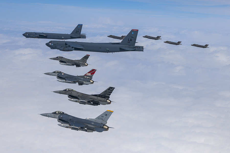 In this image from the South Korean Defense Ministry, two U.S. Air Force B-52H strategic bombers (top L) flying with South Korean Air Force F-35A (top R) and U.S. Air Force F-16 (front) fighter jets during a joint air drill in South Korea in April. South Korea is accelerating plans to deploy the F-35A and other systems to counter North Korea’s nuclear threats.  (Photo by South Korean Defense Ministry via Getty Images)